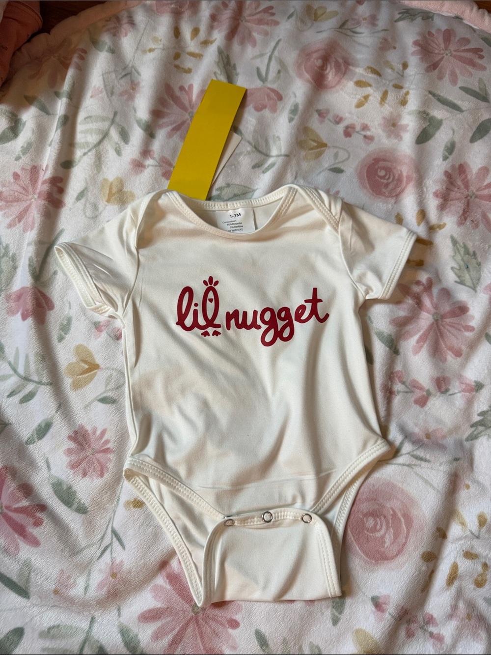 Cream Baby One-Piece Bodysuit with Red Logo